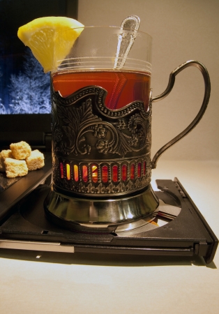  Laptop and a cup of tea  With a slice of lemon の写真素材