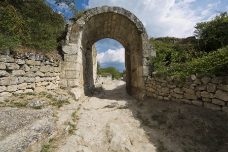 The cave town of Chufut-Kale in Bakhchisarai  Ukraine, Crimea  The gates of Orta-Kapuの写真素材