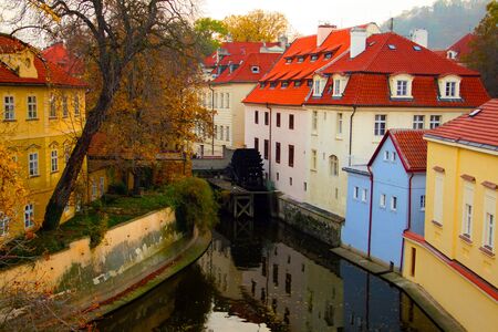 A water mill on a river in Prague, Czech Republic の写真素材
