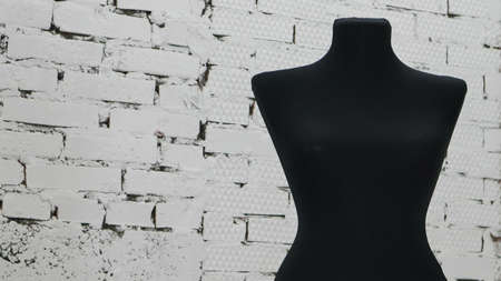 black clothing mannequin on a white background