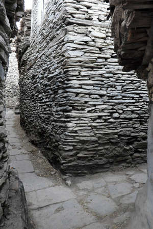A stone street in the amazing old Nepalese mountain village Marphaの写真素材