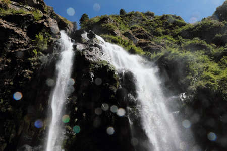 Waterfall in the mountains in Nepalの写真素材
