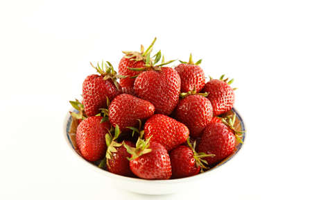 juicy strawberries on isolated white backgroundの写真素材