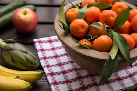 beautiful juicy tangerines in a jugの写真素材