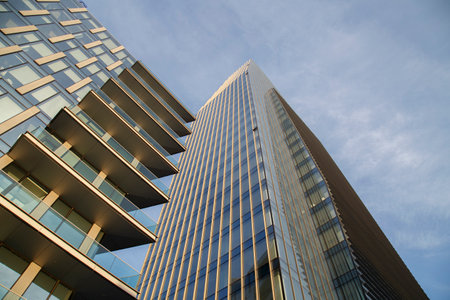 Modern office building with blue sky background. Perspective view of modern skyscrapers.