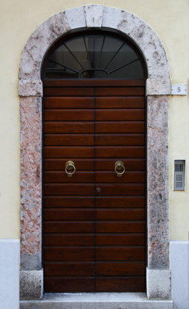Old wooden door in the old town of Rovinj, Croatiaの写真素材