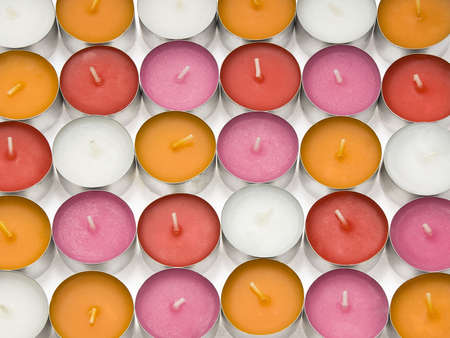 Little candles used for aroma lamps of different colors.の写真素材
