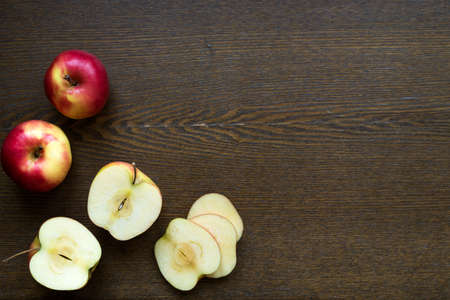 Apples on a wooden board with a copy space.の写真素材