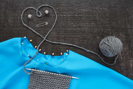 Knitting and needlework on black background