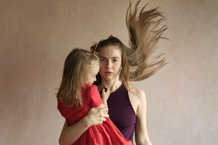 Woman and her daughter taking selfieの写真素材