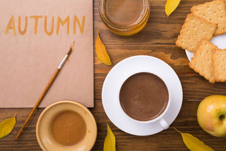 Autumn composition with coffee and leavesの写真素材