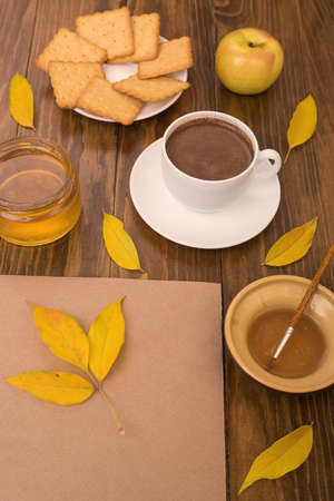 Autumn composition with coffee and leavesの写真素材