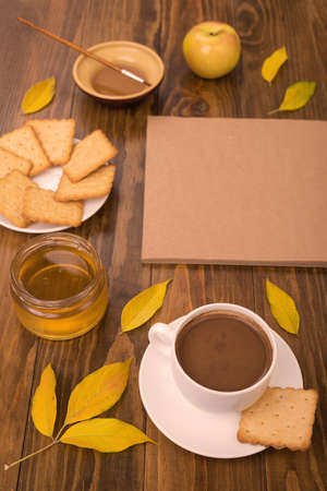 Autumn composition with coffee and leavesの写真素材