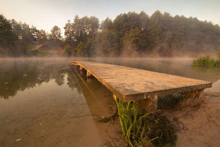 Old bridge on the early morningの写真素材