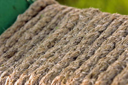 Old rope fibers impregnated with sea water and discolored
