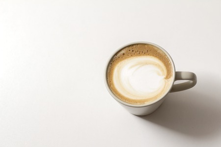 Top view of hot coffee latte cappucino cupの写真素材
