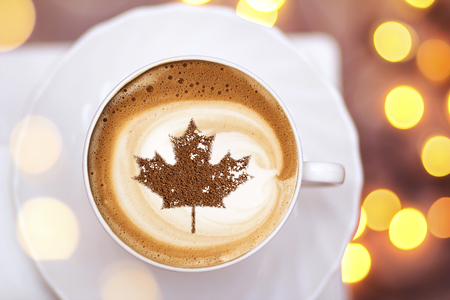 July 1 Independence Day Canada drawing a clover on a cup of coffeeの写真素材