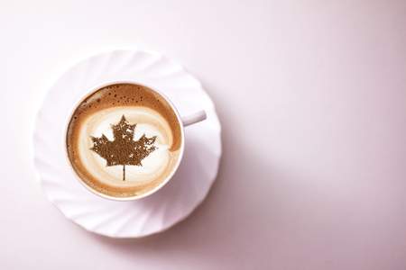 July 1 Independence Day Canada drawing a clover on a cup of coffeeの写真素材