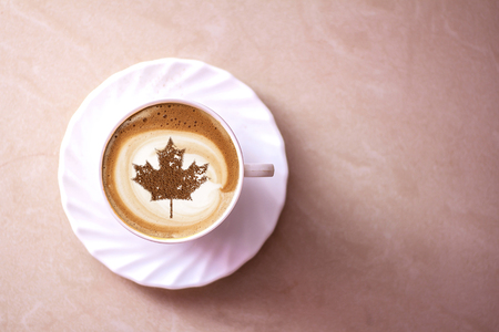 July 1 Independence Day Canada drawing a clover on a cup of coffeeの写真素材