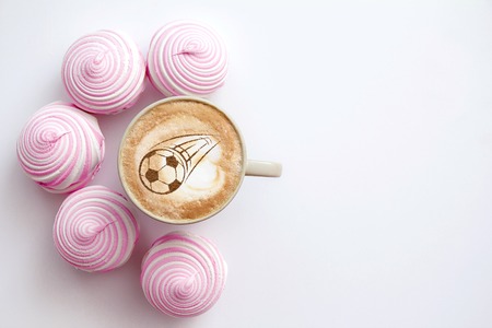 Coffee cappuccino in a cup for breakfast for a football fanの写真素材