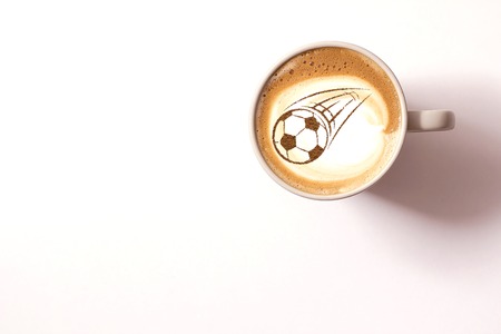 Coffee cappuccino in a cup for breakfast for a football fanの写真素材