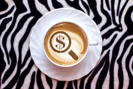 magnifier and coffee cupの写真素材
