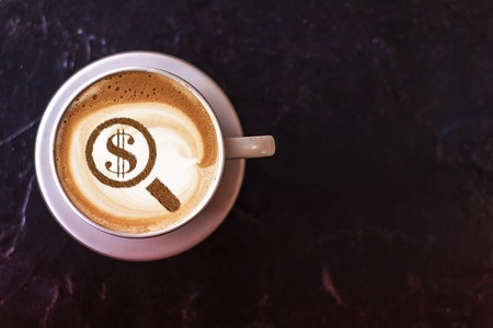 magnifier and coffee cupの写真素材