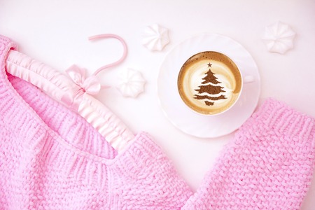 cup of Christmas cappuccino coffee with a Christmas tree patternの写真素材