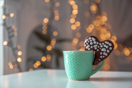 Cup of espresso and biscotti. Cup of coffee with a sweet cookie and coffee beans. Symbolic image. Rustick wooden background. Close up.の写真素材