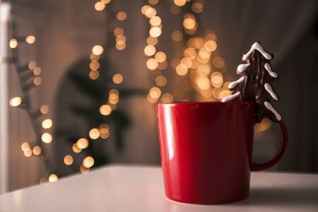 Cup of espresso and biscotti. Cup of coffee with a sweet cookie and coffee beans. Symbolic image....