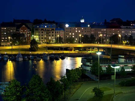 Helsinki downtown in night illuminated by streetlightsの写真素材