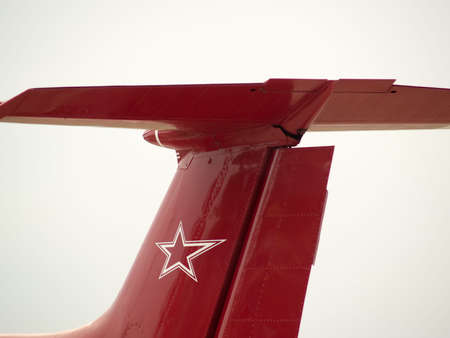 Russian jet training red plane tail close-up の写真素材
