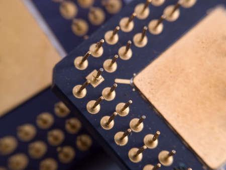 Two old CPUs close-up over each otherの写真素材