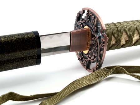 Japanese samurai katana close-up isolated on white