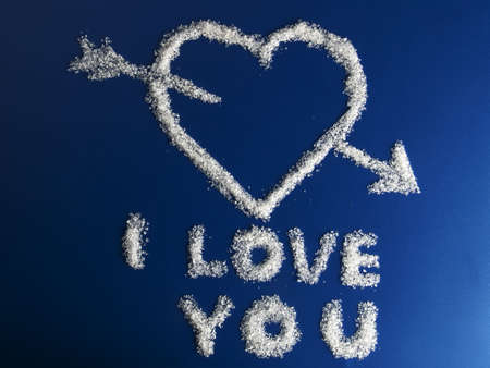 I Love You phrase made fromon sugar on blue background の写真素材