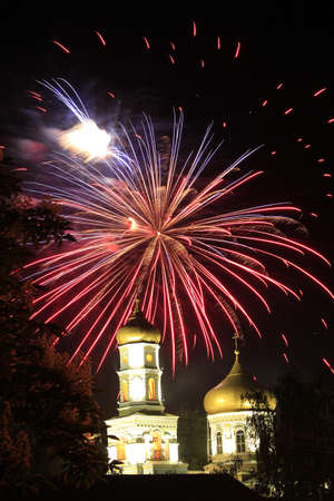 Fireworks above Pavlograd orthodox church at nightの写真素材