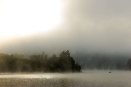 Dpectacular deep fog over river at dawnの写真素材