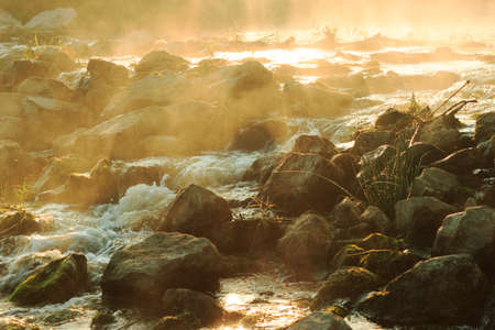 Dawn over Rushing riverの写真素材