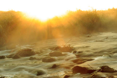 Dawn over Rushing river