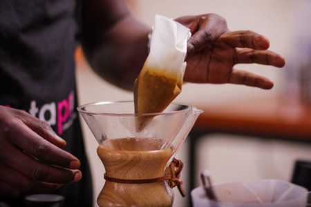 Coffee brewing process. Close-up of a barista brewing coffee.の写真素材