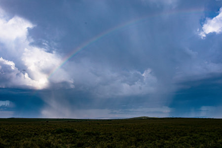 Rainbow in the Sky over a meadow in the Yorkshire Dalesの写真素材