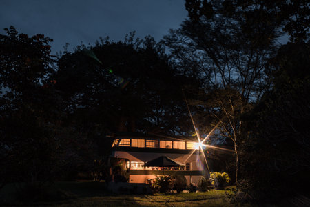 Night view of a country house in the middle of the forest.の写真素材