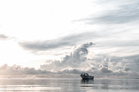Fishing boat on the sea at sunset. Beautiful seascape.
