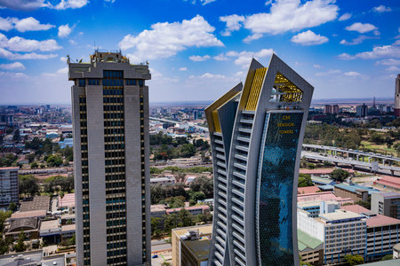 Nairobi City County Skyline Skyscrapers. Nairobi is Kenyaâs capital city. In addition to its urban core, the city has Nairobi National Park, a large game reserve known for breedingのeditorial素材