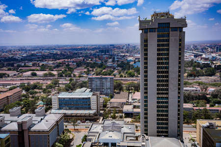 Nairobi City County Skyline Skyscrapers. Nairobi is Kenyaâs capital city. In addition to its urban core, the city has Nairobi National Park, a large game reserve known for breedingのeditorial素材