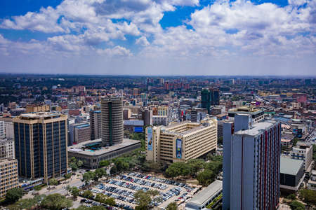 Nairobi City County Skyline Skyscrapers. Nairobi is Kenyaâs capital city. In addition to its urban core, the city has Nairobi National Park, a large game reserve known for breedingのeditorial素材
