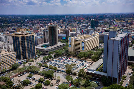 Nairobi City County Skyline Skyscrapers. Nairobi is Kenyaâs capital city. In addition to its urban core, the city has Nairobi National Park, a large game reserve known for breedingのeditorial素材