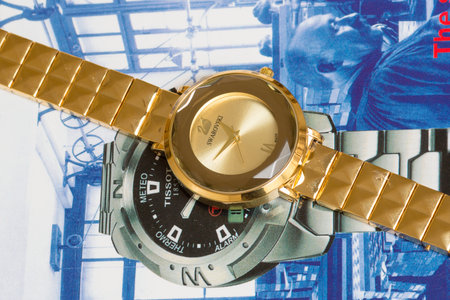 A close up shot of a gold wristwatch.の写真素材