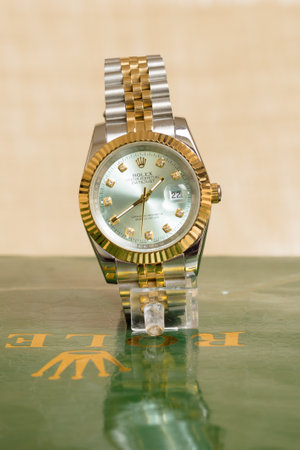 Luxury wristwatch on display in a shop, closeup of photo