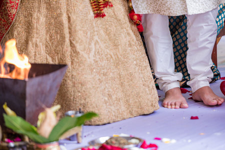 Close up of the feet of a Hindu priest during a religious ceremony.の写真素材